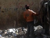 بالصور.."النباشون"يعبثون بالقمامة فى غياب الأجهزة التنفيذية بالإسكندرية