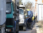 بالصور.. قافلة مساعدات إنسانية تدخل ضاحية محاصرة فى دمشق