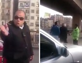 بالفيديو.. مشاجرة بين أمين شرطة ومواطن فى الشارع