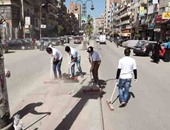 بالصور.. شباب الجامعة يشاركون فى نظافة حى العجمى بالإسكندرية 