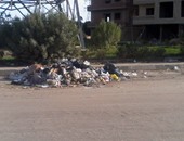 سكان حدائق الأهرام يشكون من انتشار القمامة وغياب عمال النظافة