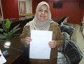 موظفة بهيئة محو الأمية بسوهاج تتبرع بجزء من راتبها مدى الحياة لـ"تحيا مصر"