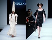 قبعات الرأس بأشكال مختلفة فى عرض ZHUZBAY Aizhan بأسبوع الموضة الصينى