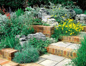 بالصور.. تصميمات لمقاعد وشلالات صناعية وممرات لتجميل حديقتك