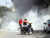 أهالى "فيصل" يشعلون النيران فى شعارات رابعة بعد هروب الإخوان