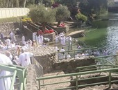 بالصور.. الأقباط يزورون سجن المسيح ويغطسون فى نهر الأردن بالقدس