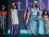 ملابس أطفال بروح خليجية لربيع وصيف 2016 من عرض مهرجان الأزياء العربية
