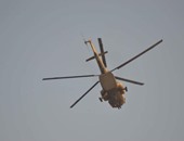 طائرة هليكوبتر تحلق فى سماء "التحرير" لتأمين احتفالات عيد تحرير سيناء