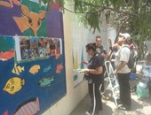 هنلون شوارعنا.. حدائق حلوان ورواد البيئة يرسمون جدارية 20 مترا لتجميل المنطقة