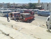 بالصور.. نقل المواطنين فى سيارات المواشى بموقف البرج غرب الإسكندرية