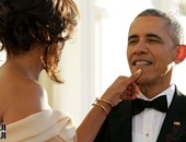 ميشيل أوباما تداعب زوجها فى حفل عشاء لرؤساء شمال أوروبا