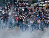 بالصور.. مواجهات بين الشرطة الفنزويلية ومطالبين برحيل الرئيس "مادورو"