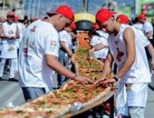 إيطاليا تصنع أطول بيتزا فى العالم وتحطم الرقم القياسى فى موسوعة جينيس