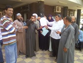 بالصور.. وقفة احتجاجية لعمال مدارس بكفر الشيخ للمطالبة بالتثبيت