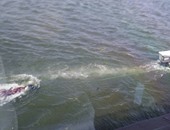 قوات الإنقاذ النهرى تنتشل جثة شخص غرق فى مياه النيل بالدقى