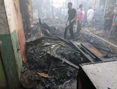 صور آثار حريق هائل التهم 18 محلا تجاريا فى سوق الخارجة بالوادى الجديد