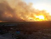 قارئ "اليوم السابع" يرسل صور حريق هائل بملاحات الطريق الدولى الساحلى