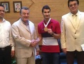 رئيس جامعة بنها يكرم لاعب منتخب مصر الفائز بطولة العالم للكونغ فو بإندونيسيا