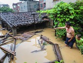 بالصور.. مصرع 2 وفقدان 17 وتدمير 1000 منزل بسبب إعصار "نيبارتاك" بالصين