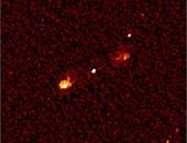 بالصور.. تلسكوب MeerKAT ينجح فى التقاط صورة تجمع 1200 مجرة