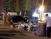 تلال القمامة فى شارع محمد نجيب بالإسكندرية والأهالى يستغيثون بالمحافظ