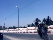 أعمدة إنارة مضاءة نهارا بمدينة سوهاج