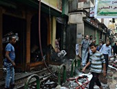 النيابة تعاين عقارى الموسكى المحترقين وترجح وقوعه نتيجة ماس كهربائى