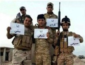 مستخدمو "تويتر" يتداولون صورة لجنود عراقيين يعلنون اتحادهم ضد داعش