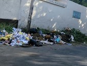 صحافة المواطن.. القمامة تحاصر مدرسة خاصة بمحيط قصر الاتحادية