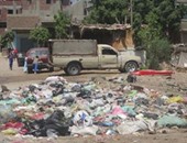 بالصور.. انتشار القمامة بالمدخل الرئيسى بقرية ميت ربيعة بالشرقية