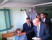 بالصور.. وزير الصحة يزور مصابى تفجير مبنى الأمن الوطنى بمستشفى النيل بشبرا