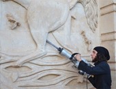 بالصور.. داعش يواصل تحطيم معالم التاريخ والآثار الأشورية بالعراق