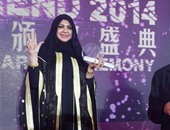 منى المنصورى تفوز بجائزة أفضل مصممة أزياء عربية بقارة آسيا لـ2014