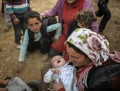 بالصور.. فرار آلاف الأكراد من سوريا إلى تركيا هربا من "داعش"