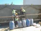 بالصور.. عمال البناء يواصلون صيانة أسوار ومبانى جامعة الأزهر