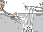 كاريكاتير إسرائيلى: الأسد دمية فى يد بوتين وأوباما يحاول قطع الحبال