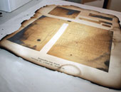 ضبط مخطوطات أثرية بحوزة سمسار داخل مسكنه فى العجوزة
