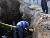 عمال شركة الغاز بالجيزة ينتهون من إصلاح ماسورة شارع كفر طهرمس