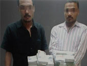 حبس عامل وسائق لاتهامهما بسرقة خزينة من محل بالدرب الأحمر