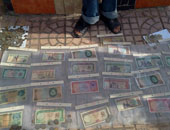 ضبط تجار عملة جمعوا 300 ألف ريال سعودى و100 ألف دولار من مدخرات المصريين بالخارج