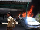 ملثمون يضرمون النار فى سيارتين بشمال سيناء