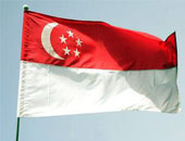 إسرائيل تعتذر عن استخدام أحد دبلوماسيها علم سنغافورة غطاء طاولة