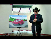 أشرف أرماغان فنان تركى أعمى وصل إلى العالمية بلوحاته المرسومة بطريقة برايل