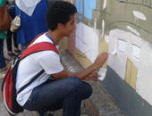 بالصور فريق "المصممين" ينادى: أخرج عجلتك القديمة وساعدنا فى رسم جدران الشوارع