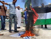 إخلاء سبيل شاب حاول حرق العلم الإسرائيلى بميدان التحرير