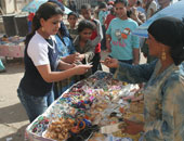 تجار بسوق البالة فى بورسعيد يعتدون على مسئولة الإذاعة المحلية أثناء تأدية عملها