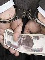 متهم وأموال - أرشيفية متهم وأموال - أرشيفية