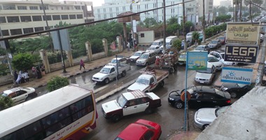 كثافات مرورية بشوارع وميادين القاهرة و الجيزة بسبب هطول الأمطار