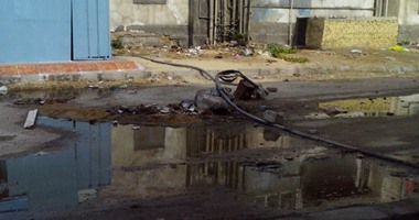بالصور.. كابلات كهرباء تهدد حياة المواطنين بالموت فى السويس