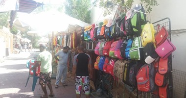 بالصور.. حملة لإزالة الإشغالات بخليج نعمة فى شرم الشيخ